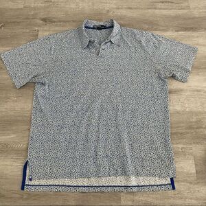 Vintage Polo Ralph Lauren Size XL Blue Hawaiian Short Sleeve Floral Polo Shirt.